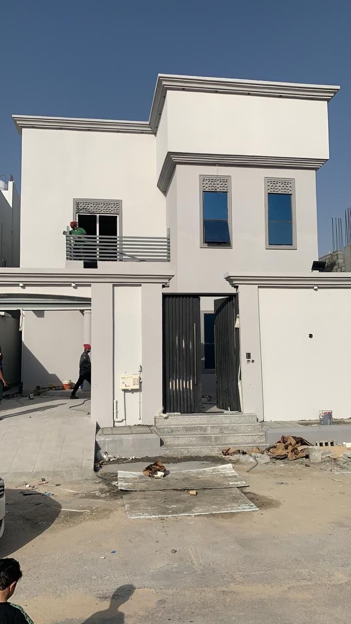 دهان واجهة منزل بلون فاتح